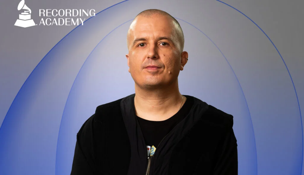 Іван Клименко на тлі логотипу Recording Academy